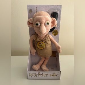 Dobby electronic interactive plush. Squeeze his tummy to hear 10 unique phrases.